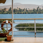 Scenic view from a Nile cruise near Luxor, highlighting the exquisite landscapes along the river, arranged by DMC Egypt.