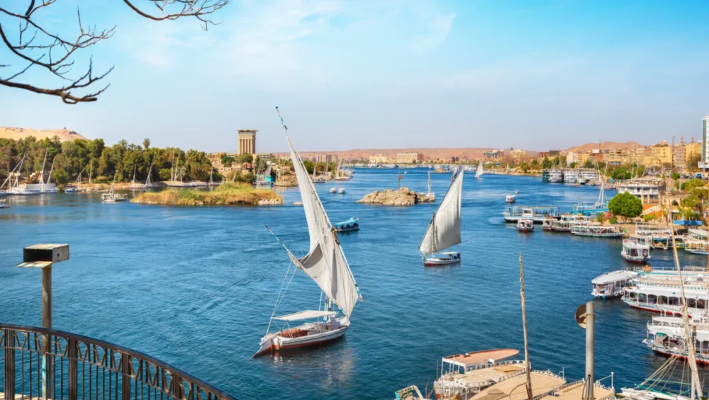 Feluccas sailing on the Nile River, Aswan, Egypt.