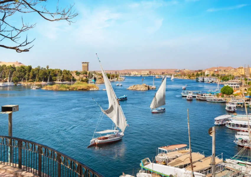 Feluccas sailing on the Nile River, Aswan, Egypt.